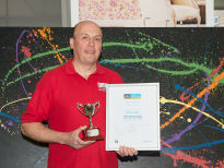 Adrian receiving his award (2)